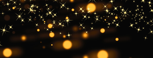 Fototapeta na wymiar Christmas glowing lights effect, black background, yellow snowflakes, stars, selection