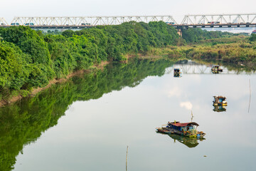 Vietnam, Hanoi, the Hong  River (red river) delta with it's house boats. 