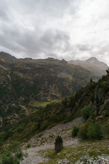 Fototapeta premium Beautiful pyrenees mountain landscape of Vallee du Soussoueou on a partly cloudy autumn day, Artouste, Nouvelle-Aquitaine, France