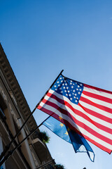 Fototapeta premium Flags of USA and European union on the building of united states embassy.