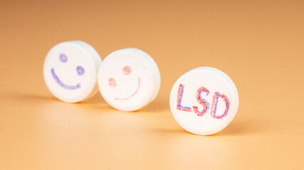 blue and red LSD pills , psychedelic drug for the treatment of severe stages of depression