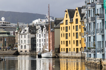 Fototapeta na wymiar The city centre of Ålesund with colorful houses and a historic harbor