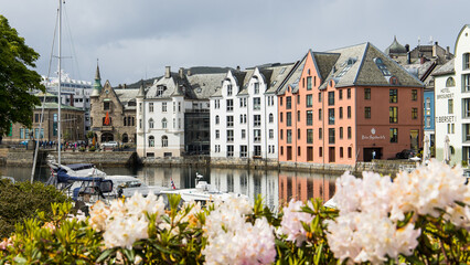 The city centre of Ålesund with colorful houses and a historic harbor