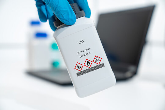 T2O tritium oxide tritiated water CAS 14940-65-9 chemical substance in white plastic laboratory packaging