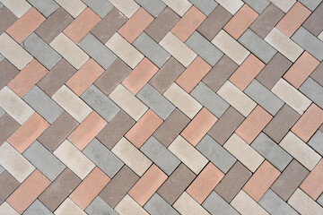 Lovely multi-colored paving slab background. View from above. Multicolor bricks and paving stones. Top view