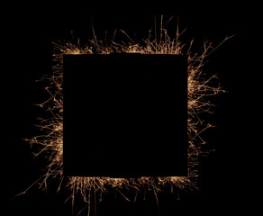 Sparkles square frame on a black background.