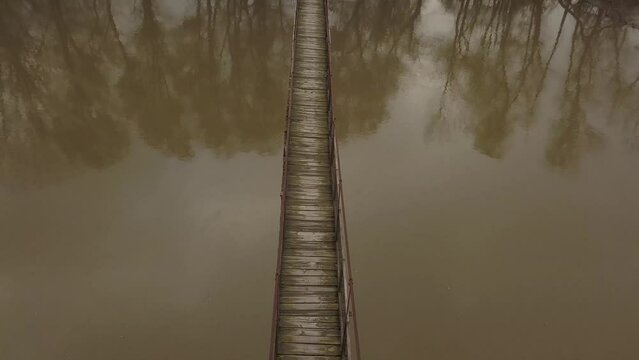 old wooden suspension bridge over - South Morava river 
