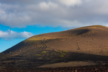 Fototapeta na wymiar Crater of Caldera Colorada Volcano in Lanzarote, Canary islands, Spain