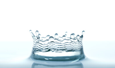 Water splash like crown on white background