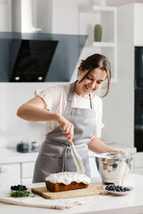 The confectioner prepares a delicious dessert in the kitchen. cooking. High quality photo