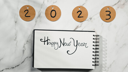 Happy New Year Sign On Notepad