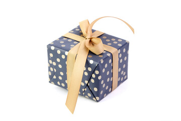 Gift box with bow isolated on white. Wrapped Christmas or birthday green color gift box. Single...
