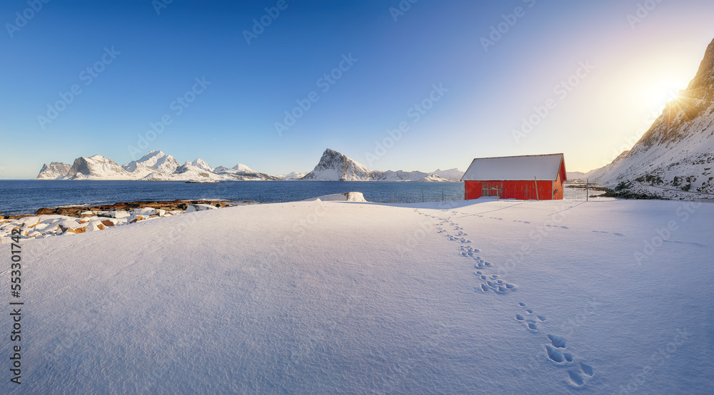 Wall mural Stunning winter view on Vetvagoy coastline seen from Storsandnes beach in the morning.