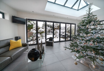 Bifold doors and skylight at Christmas / Xmas with luxury room, Christmas tree and view to garden...