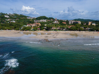 Fototapeta na wymiar Beautiful aerial view of Tamarindo Beach and Town in Guanacaste Costa Rica
