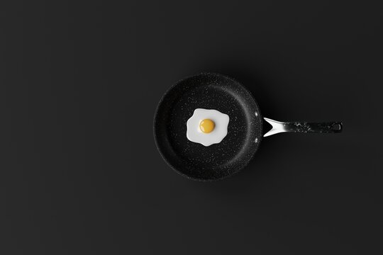Pan with a fried egg on a dark background. The concept of preparing a dish with egg, frying an egg in a pan. 3d render, 3d
