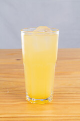 cocktail glass, on wood table