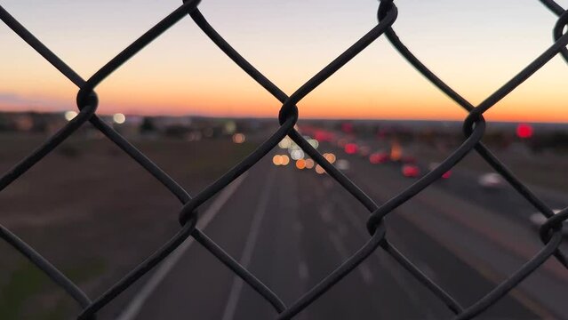 Urban Freeway Through Fence City Scene