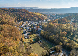 Fototapeta na wymiar Aerial view Famous German Wine Region Moselle River Lay and Guels village Autumn Fall colors