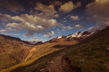 Sunset panorama of alpine highlands countryside with glaciers on the border between Italy and Austria in the Palla Bianca Massif. Popular travel destinations. Vallelunga, Alto Adige, Italy