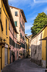 Fototapeta na wymiar Lucca, Italy. Medieval street in the old town