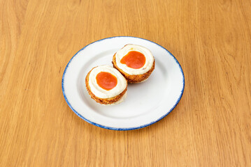 Bomba potatoes stuffed with meat are one of the most traditional and typical snacks in many tapas bars