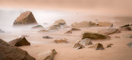 Rock landscape with sea mist