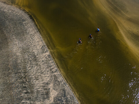 Beautiful aerial view of the Avellanas Mangrove, its iconic bridge, and the magical beach in Costa Rica Guanacaste