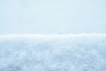 Natural winter background from snow falling on the ground