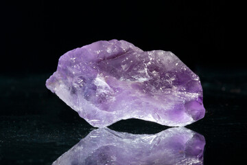 Beautiful colorful precious stones in various colors on a black background