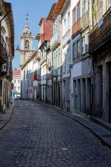 Fototapeta na wymiar One street in Braga in a sunny day