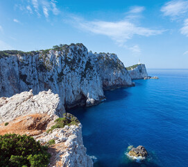 Fototapeta premium Rocky south cape of Lefkas island and lighthouse (Greece, Ionian Sea)