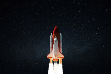 New space shuttle rocket with blast successfully takes off into the night starry sky. Spaceship...