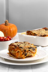 Pumpkin homemade lasagna on the kitchen table