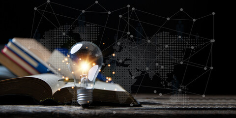 Light bulbs and books. Concept of reading books, knowledge, and searching for new ideas. Innovation...