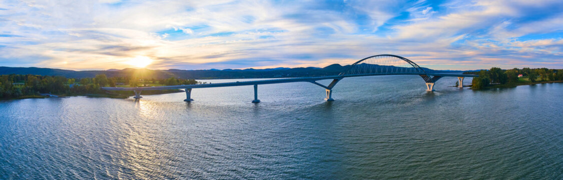 Bridge connecting New York to Vermont panoramic aerial during sunset