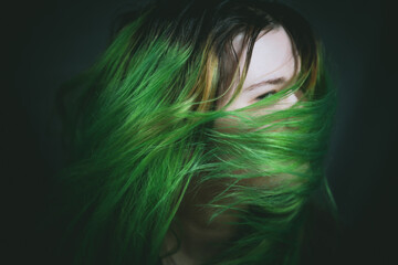 portrait of a woman girl with green hair