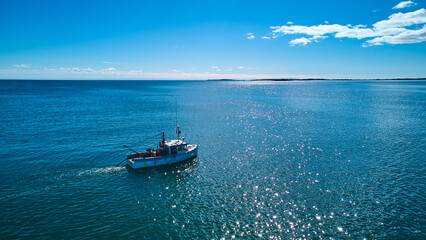 Fishing boat for lobster and clams on Maine ocean