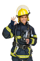 Young smiling African-American fireman in a fireproof uniform stands and make gesture ok. Isolated on white, vertical orientation