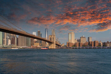 Dramatic sky over the Brooklyn Bridge and lower Manhattan
