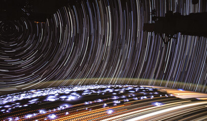 Time-lapse photography of star trails taken on the international space station from outer space....