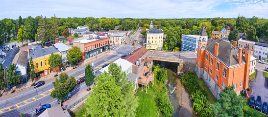 Aerial panoramic view over small town in New York Honeoye Falls