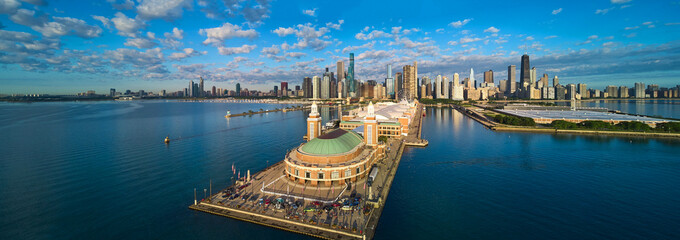 Beautiful panorama aerial over Navy Pier with vintage car show and Chicago downtown skyline during...