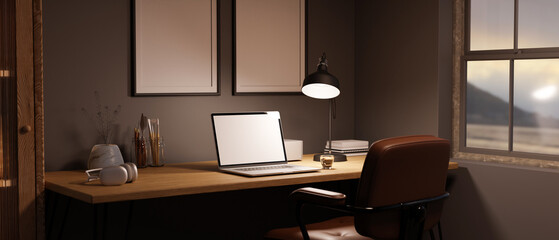 Side view of a modern home working space with laptop mockup, light from table lamp, grey wall