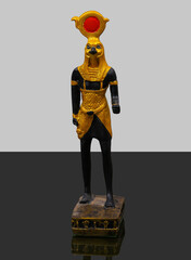 statue made of basalt stone, glass and metal dating back to the Pharaonic era