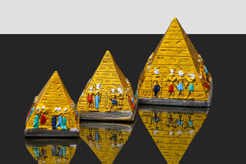 statue made of basalt stone, glass and metal dating back to the Pharaonic era