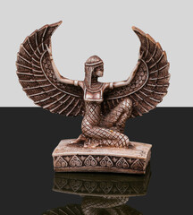 statue made of basalt stone, glass and metal dating back to the Pharaonic era