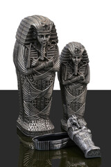 statue made of basalt stone, glass and metal dating back to the Pharaonic era