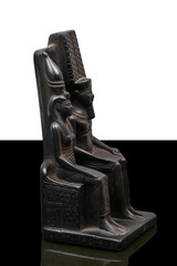 statue made of basalt stone, glass and metal dating back to the Pharaonic era