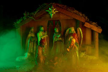 Waiting for the Messiah, manger. Christmas birth of Jesus. Nativity scene with figures. Christmas...